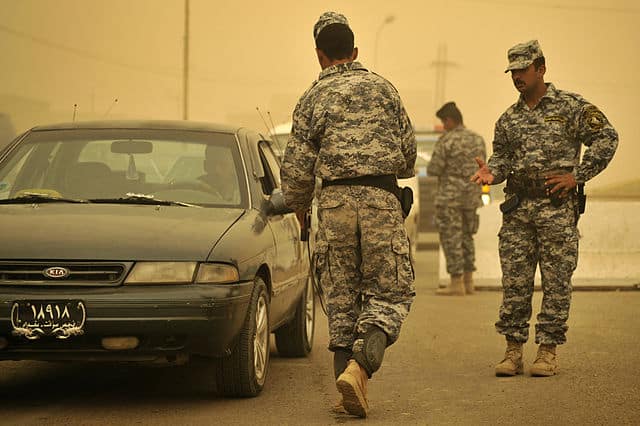 640px-US_Navy_081016-N-1810F-303_Checkpoint_in_Abu_T'Shir,_Iraq