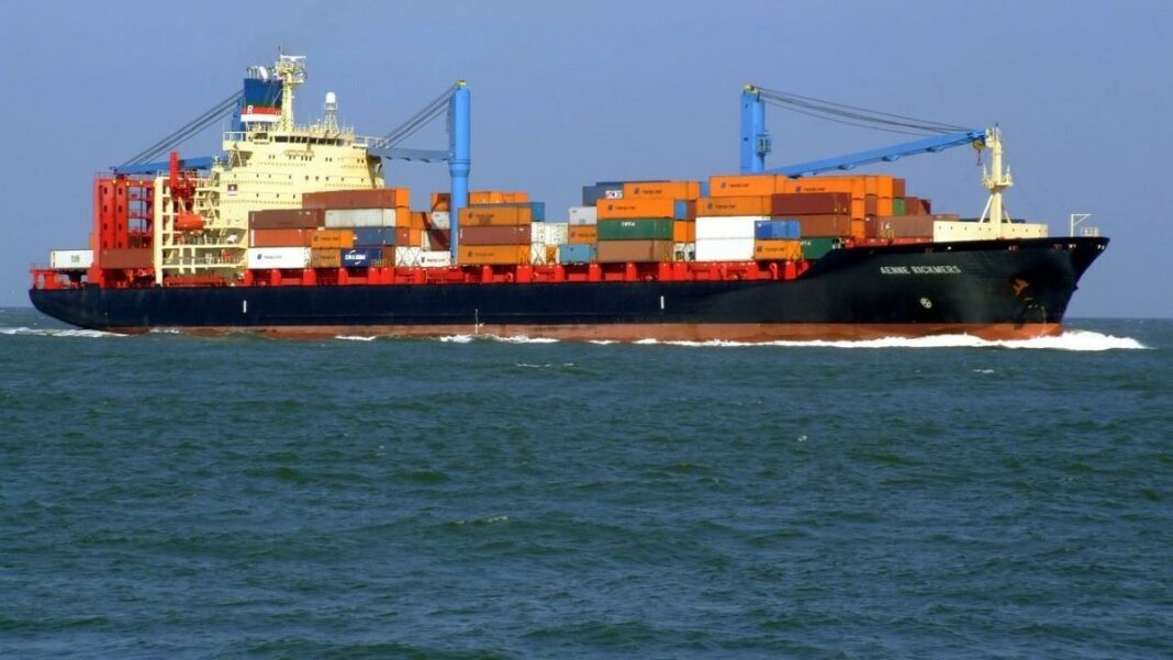 international business represented by a cargo ship underway