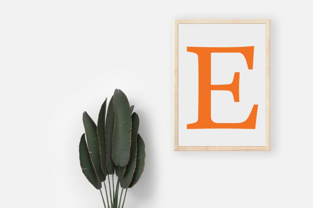 sign on the wall with an etsy logo