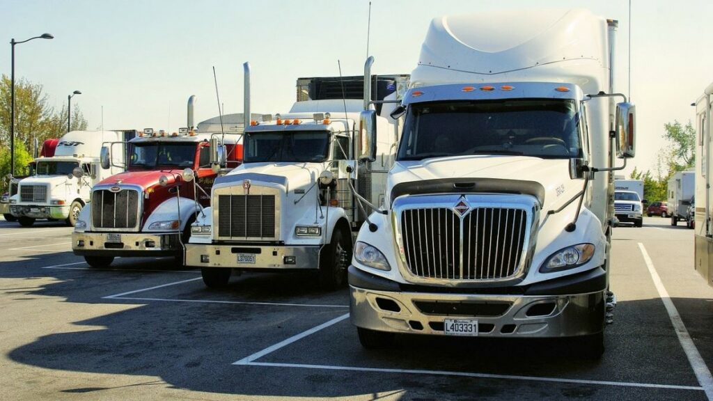 ELD solution represented by freight trucks parked in the yard of a trucking company
